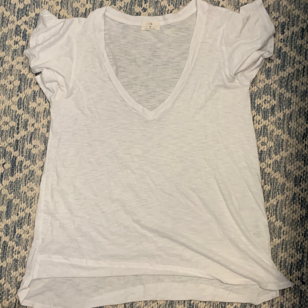 V-neck white top